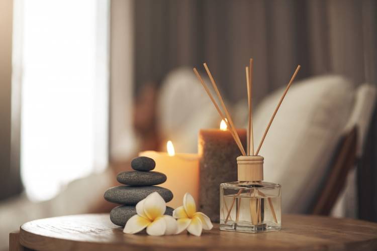 room diffuser and stones in a spa setting