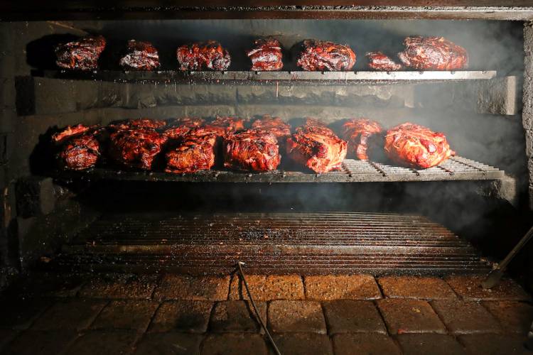 smoking bbq in a pit